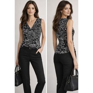 WHBM Sleeveless Blouse Black White Geo Print VNeck Banded Hem M Faux Wrap Office